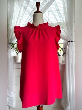 First Love blouse high ruffle neck and ruffled cap sleeves. EUC!
Size S